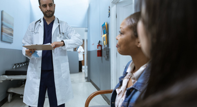 A Doctor with His Patient’s Family